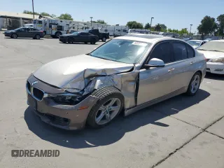 2013 BMW 3 Series 328i with VIN WBA3A5C5XDF603603, listed as a Copart auction lot 62201485 with 153,312 mi miles and Salvage title. Bid and sale history available at DreamBid. Image 1.