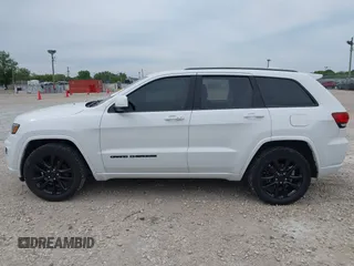 2018 Jeep Grand Cherokee Altitude with VIN 1C4RJFAG6JC164906, listed as a IAAI auction lot 42302611 with 81,447 mi miles and . Bid and sale history available at DreamBid. Image 15.