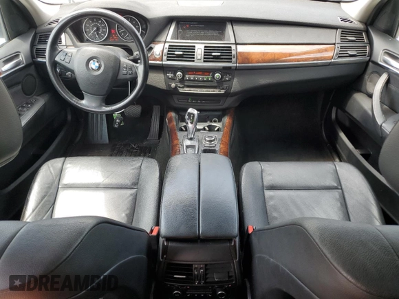 2012 BMW X5 35i with VIN 5UXZV4C50CL991452, listed as a Copart auction lot 56890265 with 147,019 mi miles and Salvage title. Bid and sale history available at DreamBid. Image 8.