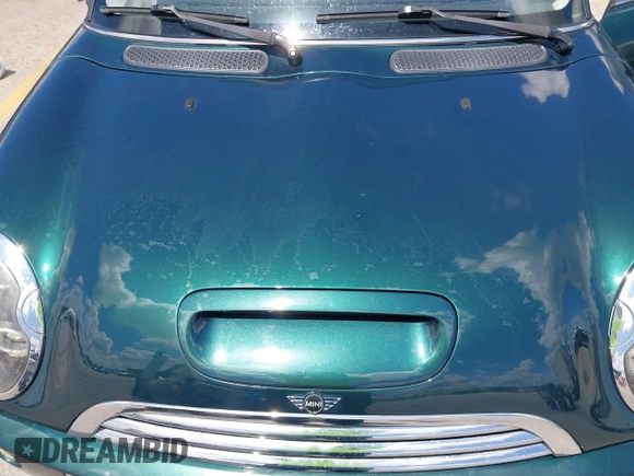 2005 MINI Hardtop S with VIN WMWRE33465TD95560, listed as a IAAI auction lot 42609791 with 133,997 mi miles and . Bid and sale history available at DreamBid. Image 6.