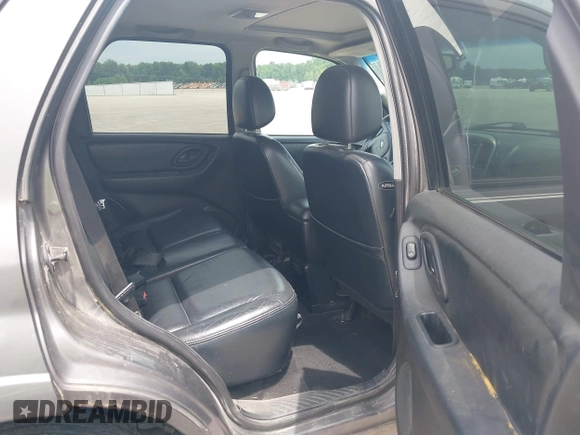 2004 Ford Escape Limited z VIN 1FMCU941X4KA49169, wystawiony jako IAAI lot #42491024 z przebiegiem 310 880 mil mil oraz . Historia ofert i sprzedaży dostępna na DreamBid. Obrazek 8.