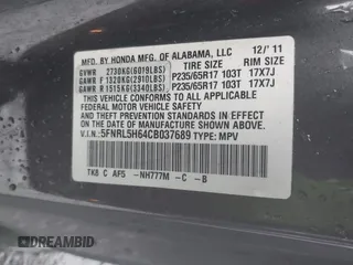 2012 Honda Odyssey EX-L with VIN 5FNRL5H64CB037689, listed as a IAAI auction lot 41857822 with 121,601 mi miles and . Bid and sale history available at carsss.com. Image 9.