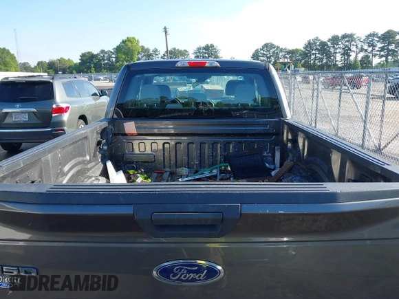2015 Ford F-150 XLT with VIN 1FTEX1EP7FKE96165, listed as a IAAI auction lot 42262766 with 260,250 mi miles and . Bid and sale history available at DreamBid. Image 16.