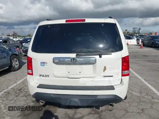 2015 Honda Pilot Touring with VIN 5FNYF3H93FB007766, listed as a IAAI auction lot 41932052 with 131,036 mi miles. Bid and sale history available at carsss.com. Image 16.