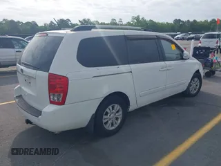 2012 Kia Sedona LX with VIN KNDMG4C7XC6446218, listed as a IAAI auction lot 42083645 with 151,844 mi miles. Bid and sale history available at carsss.com. Image 4.