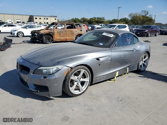 2011 BMW Z4 sDrive35i with VIN WBALM7C59BE384283, listed as a Copart auction lot 77204914 with NaN miles and Salvage Title. Bid and sale history available at carsss.com. Image 1.