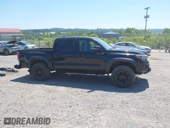 2019 Toyota Tacoma SR with VIN 5TFCZ5AN4KX208354, listed as a IAAI auction lot 42771410 with 77,509 mi miles and . Bid and sale history available at DreamBid. Image 14.
