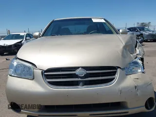 2000 Nissan Maxima GXE z VIN JN1CA31D0YT739248, wystawiony jako IAAI lot #42089086 z przebiegiem 140 979 mil mil oraz . Historia ofert i sprzedaży dostępna na DreamBid. Obrazek 12.