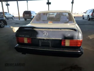 1990 Mercedes-Benz 560 with VIN WDBCA39EXLA503543, listed as a Copart auction lot 83086254 with 195,635 mi miles and Clean Title. Bid and sale history available at DreamBid. Image 6.