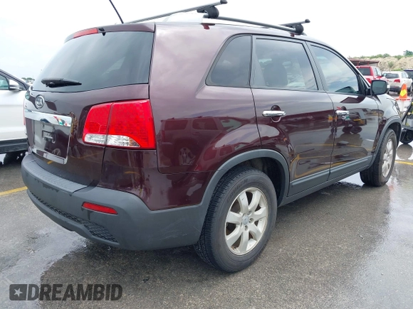 2013 Kia Sorento LX with VIN 5XYKT4A28DG387792, listed as a IAAI auction lot 42650144 with 93,136 mi miles and . Bid and sale history available at DreamBid. Image 4.