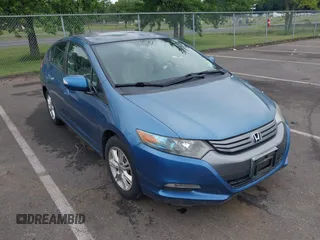 2010 Honda Insight EX with VIN JHMZE2H71AS017982, listed as a IAAI auction lot 42795637 with 125,793 mi miles and . Bid and sale history available at DreamBid. Image 1.
