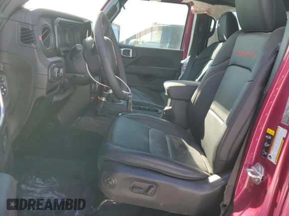 2024 Jeep Wrangler Rubicon with VIN 1C4PJXFG9RW346079, listed as a Copart auction lot 77006914 with 2,446 mi miles and Salvage Title. Bid and sale history available at DreamBid. Image 7.