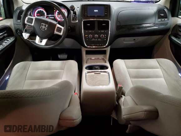 2014 Dodge Grand Caravan SXT z VIN 2C4RDGCG7ER274497, wystawiony jako Copart lot #49851495 z przebiegiem 130 309 mil mil oraz Czysty tytuł • Clean title. Historia ofert i sprzedaży dostępna na DreamBid. Obrazek 8.