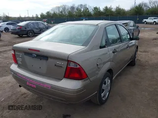 2005 Ford Focus S with VIN 1FAHP34N35W144951, listed as a IAAI auction lot 41880459 with 141,333 mi miles and . Bid and sale history available at carsss.com. Image 4.