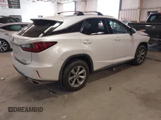 2018 Lexus RX 350 z VIN 2T2BZMCA5JC144530, wystawiony jako IAAI lot #41417396 z przebiegiem 97 860 mil mil oraz . Historia ofert i sprzedaży dostępna na DreamBid. Obrazek 4.