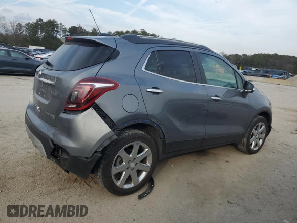 2020 Buick Encore Essence z VIN KL4CJGSB6LB020497, wystawiony jako Copart lot #43624955 z przebiegiem 99 448 mil mil oraz Tytuł czysty. Historia ofert i sprzedaży dostępna na DreamBid. Obrazek 3.