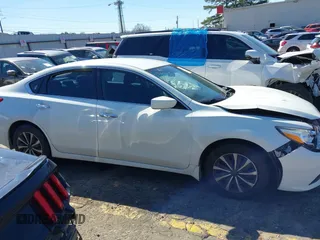 2016 Nissan Altima SR with VIN 1N4AL3AP6GC145745, listed as a IAAI auction lot 41737443 with 101,545 mi miles and . Bid and sale history available at DreamBid. Image 13.