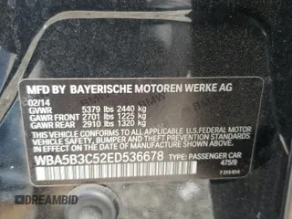 2014 BMW 5 Series 535i xDrive with VIN WBA5B3C52ED536678, listed as a Copart auction lot 61606815 with 53,412 mi miles and Salvage title. Bid and sale history available at DreamBid. Image 12.