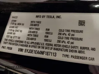 2022 Tesla Model 3 with VIN 5YJ3E1EA4NF187113, listed as a IAAI auction lot 41712331 with 81,879 mi miles and . Bid and sale history available at DreamBid. Image 9.