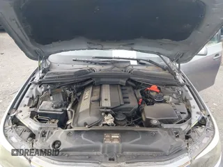 2005 BMW 5 Series 525i with VIN WBANA53535B857896, listed as a IAAI auction lot 42164290 with 207,711 mi miles. Bid and sale history available at carsss.com. Image 10.