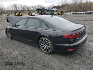 2022 Audi A8 with VIN WAULDAF85NN004895, listed as a Copart auction lot 51758025 with 61,164 mi miles and Salvage title. Bid and sale history available at DreamBid. Image 2.