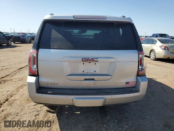 2017 GMC Yukon SLT with VIN 1GKS2BKC9HR345688, listed as a Copart auction lot 52303075 with 122,969 mi miles and Salvage Title. Bid and sale history available at carsss.com. Image 6.