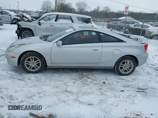 2000 Toyota Celica GT with VIN JTDDR32TXY0025192, listed as a IAAI auction lot 41596855 with 153,562 mi miles. Bid and sale history available at carsss.com. Image 14.