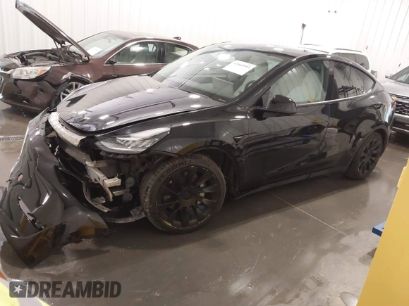 2021 Tesla Model Y Long Range with VIN 5YJYGAEE5MF305655, listed as a IAAI auction lot 41860993 with 50,750 mi miles. Bid and sale history available at carsss.com. Image 22.