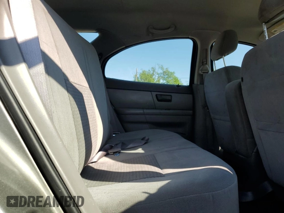 2004 Ford Taurus SE with VIN 1FAFP58S44A108250, listed as a Copart auction lot 58520615 with 119,575 mi miles and Salvage title. Bid and sale history available at DreamBid. Image 11.