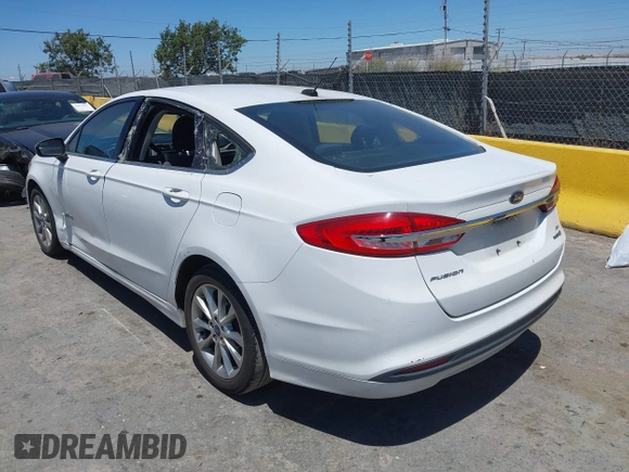 2017 Ford Fusion Hybrid SE with VIN 3FA6P0LU3HR326980, listed as a IAAI auction lot 42692591 with 141,122 mi miles and . Bid and sale history available at DreamBid. Image 3.