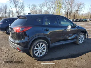 2013 Mazda CX-5 Grand Touring with VIN JM3KE4DE5D0168253, listed as a Copart auction lot 52112935 with 143,375 mi miles and Salvage Title. Bid and sale history available at carsss.com. Image 3.