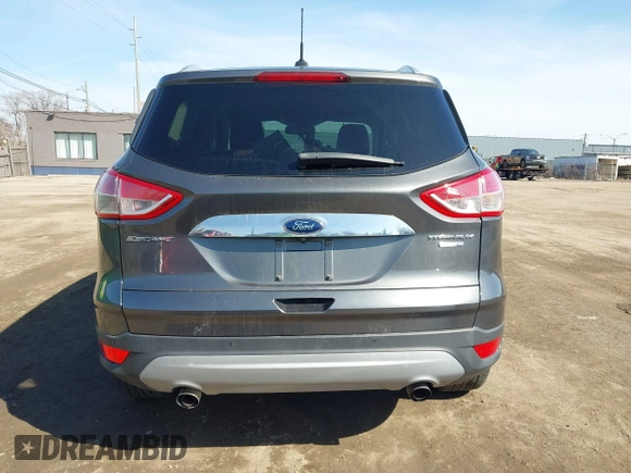 2016 Ford Escape Titanium with VIN 1FMCU9JX5GUA65412, listed as a IAAI auction lot 41859123 with 80,208 mi miles and . Bid and sale history available at DreamBid. Image 16.