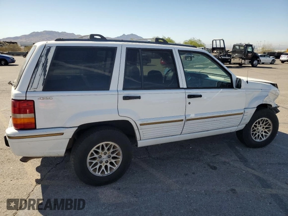 1995 Jeep Grand Cherokee Limited with VIN 1J4GZ78Y3SC701103, listed as a Copart auction lot 72038184 with 143,829 mi miles and Salvage Title. Bid and sale history available at carsss.com. Image 3.