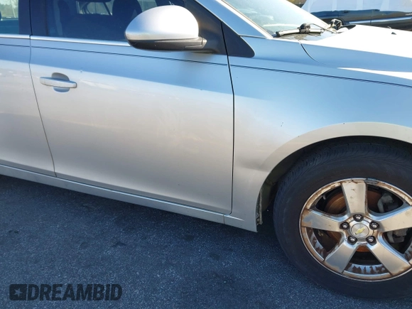 2014 Chevrolet Cruze 1LT with VIN 1G1PC5SB8E7201279, listed as a IAAI auction lot 41851574 with 125,806 mi miles and . Bid and sale history available at DreamBid. Image 14.