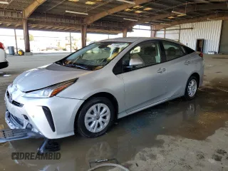 2021 Toyota Prius L Eco z VIN JTDKAMFU9M3128216, wystawiony jako Copart lot #56337715 z przebiegiem 40 944 mil mil oraz Czysty tytuł • Clean title. Historia ofert i sprzedaży dostępna na DreamBid. Obrazek 1.