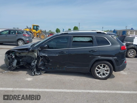 2016 Jeep Cherokee Altitude with VIN 1C4PJLCB7GW201332, listed as a IAAI auction lot 42061266 with 118,353 mi miles and . Bid and sale history available at DreamBid. Image 14.