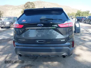2020 Ford Edge Titanium with VIN 2FMPK3K94LBB10568, listed as a IAAI auction lot 42430196 with 76,490 mi miles and . Bid and sale history available at DreamBid. Image 17.