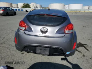 2012 Hyundai Veloster w/Gray Int z VIN KMHTC6AD9CU079542, wystawiony jako Copart lot #55998045 z przebiegiem 98 065 mil mil oraz Szkoda całkowita • Salvage title. Historia ofert i sprzedaży dostępna na DreamBid. Obrazek 6.