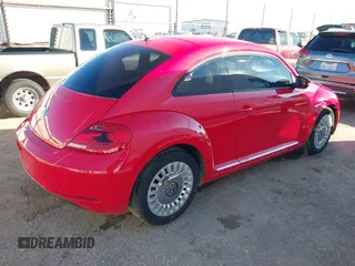2013 Volkswagen Beetle with VIN 3VWHX7AT3DM682758, listed as a IAAI auction lot 40869170 with 88,793 mi miles and . Bid and sale history available at DreamBid. Image 4.