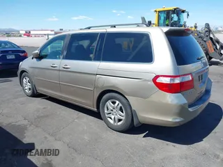2007 Honda Odyssey EX z VIN 5FNRL38407B123509, wystawiony jako IAAI lot #42238353 z przebiegiem 200 111 mil mil oraz . Historia ofert i sprzedaży dostępna na DreamBid. Obrazek 3.