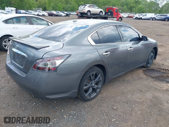 2014 Nissan Maxima S with VIN 1N4AA5AP9EC432415, listed as a IAAI auction lot 42230164 with 149,080 mi miles and . Bid and sale history available at DreamBid. Image 4.