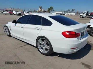2015 BMW 4 Series 428i with VIN WBA4A9C50FGL85857, listed as a IAAI auction lot 42542619 with 136,411 mi miles and . Bid and sale history available at DreamBid. Image 3.