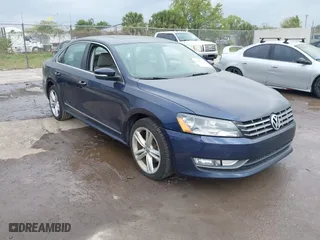 2013 Volkswagen Passat SEL Premium with VIN 1VWCM7A35DC061462, listed as a IAAI auction lot 41767171 with 163,708 mi miles. Bid and sale history available at carsss.com. Image 1.
