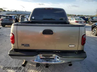 2001 Ford F-150 SuperCrew XLT with VIN 1FTRW07W21KE22048, listed as a Copart auction lot 76839504 with 226,011 mi miles and Clean Title. Bid and sale history available at carsss.com. Image 6.