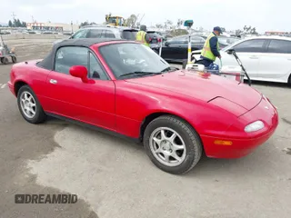 1996 Mazda MX-5 Miata z VIN JM1NA3538T0719198, wystawiony jako IAAI lot #41900994 z przebiegiem 60 555 mil mil oraz . Historia ofert i sprzedaży dostępna na DreamBid. Obrazek 1.