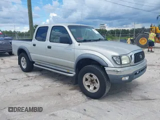 2004 Toyota Tacoma PreRunner with VIN 5TEGN92N74Z411950, listed as a IAAI auction lot 42536808 with 201,453 mi miles and . Bid and sale history available at DreamBid. Image 1.