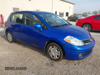 2012 Nissan Versa S with VIN 3N1BC1CP2CK284357, listed as a IAAI auction lot 41911223 with 164,806 mi miles. Bid and sale history available at carsss.com. Image 1.
