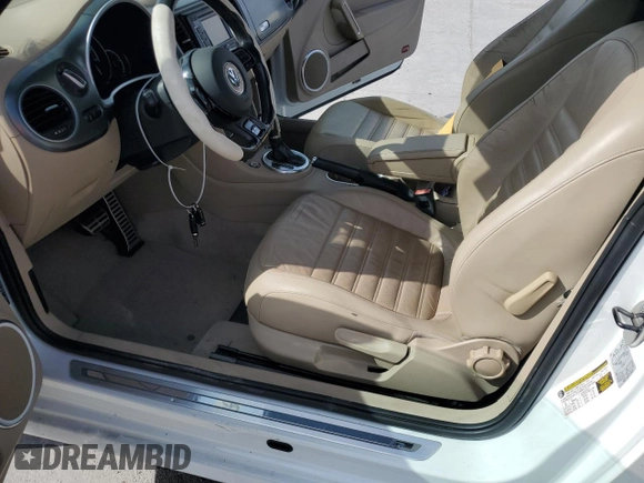 2014 Volkswagen Beetle with VIN 3VW7S7AT5EM815435, listed as a Copart auction lot 43213645 with 109,082 mi miles and Salvage Title. Bid and sale history available at DreamBid. Image 7.