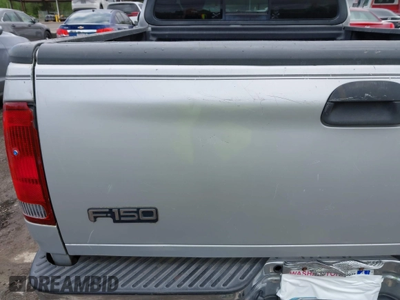 2002 Ford F-150 z VIN 2FTRX17L42CA98695, wystawiony jako IAAI lot #42154232 z przebiegiem 180 924 mil mil oraz . Historia ofert i sprzedaży dostępna na DreamBid. Obrazek 12.