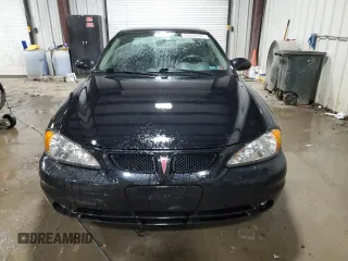 2004 Pontiac Grand Am SE with VIN 1G2NE52F94C180674, listed as a Copart auction lot 82090394 with 48,652 mi miles and Salvage Title. Bid and sale history available at carsss.com. Image 5.